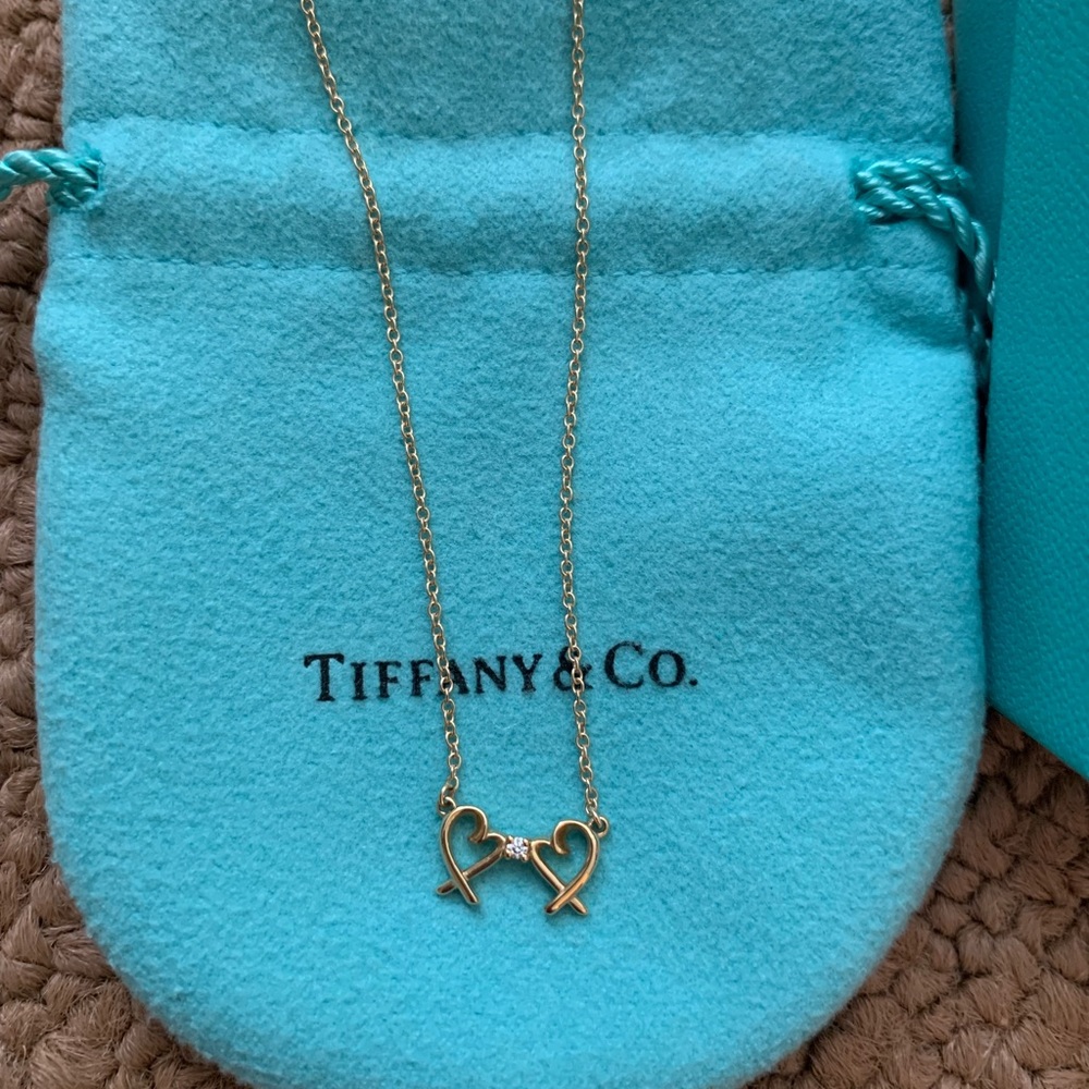 Tiffany & Co. 18k gold Double Loving Heart Pendant w/ 0.1 carat diamond